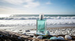 © Sorosoti - Glass perfume bottle on driftwood with ocean waves background