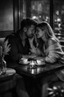 © IrenKa - Romantic couple sharing an intimate evening in a stylish urban café, black and white portrait with candles, coffee and deep emotional connection