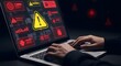 © Aklima - Cybersecurity holography digital warning system display on laptop with hands typing