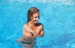 © misu - Naked Woman Relaxing In Swimming Pool