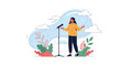 © Mostofa - Confident woman standing on a stage behind a microphone delivering a motivational speech at a conference or public event.