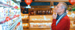 © Prostock-studio - A man stands in a grocery store aisle, deep in thought as he examines various products on the shelves. He appears to be deciding what to buy. The store is bright and busy with other shoppers around.