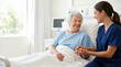 © Xenia - Caring nurse holding hands with smiling elderly Caucasian female patient in hospital bed. Compassionate healthcare professional comforting senior woman in clinic ward