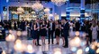 © MDALIF - Elegant gala event with guests in formal attire sparkling lights and modern venue decor