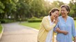 © Николай Срибяник - Happy senior women walking together and laughing in a park