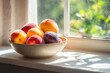 © Tetiana - Beautiful Bowl of Fresh Peaches and Plums on Sunny Windowsill with Garden View Summer Healthy Food Generative AI
