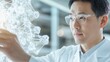 © Megin Design - 光る分子構造を観察する科学者。バイオテクノロジーと医療研究の最前線。現代的な研究所での実験風景