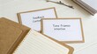 © Finasulizi - Cards with text feedback and tone on a notepad, workspace with natural light, organized study materials, creative process in action, education setting
