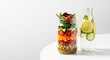 © Taufiqur - Healthy Layered Salad in a Jar with Infused Water.