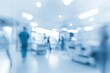 © future7 - Blurred image of a hospital hallway with medical staff and equipment, evoking a clinical and sterile environment.
