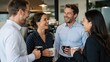 © Hance - Dynamic group of office employees sharing lighthearted jokes and coffee in a modern breakroom setting, highlighting authentic professional relationships and the importance of workplace social tea.