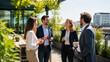 © Hesham - Diverse business team enjoying a refreshing coffee break on a modern outdoor office terrace surrounded by lush green spring plants on a bright sunny day, promoting collaboration and workspace