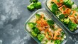 © tynza - High protein meal prep containers with chicken, broccoli, and rice, fitness nutrition concept, clean composition, natural daylight