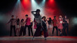 © Lustre Art Group  - Young female dancer posing in smoky concert lights with group dancing behind. Concept of dance class campaign, stage show poster, music video casting and youth culture promo.