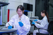 © Surachai - Scientific research in laboratory experimentation with equipment high-tech environment focused viewpoint