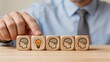 © Henry - Hand turning wooden block with light bulb icon among brain icons, representing innovation, new idea, creative thinking, problem solving, strategy development, mental process,