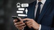 © Layla - Businessman using smartphone with chatbot conversation interface, artificial intelligence customer support and automated messaging service concept.