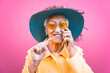 © oneinchpunch - Funny grandmother portraits. Senior old woman, interacting with a smartphone. Concept about seniority