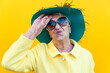 © oneinchpunch - Funny grandmother portraits. Senior old woman dressing elegant for a special event. Concept about seniority
