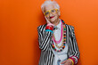 © oneinchpunch - Funny grandmother portraits. Senior old woman dressing elegant for a special event. granny fashion model on colored backgrounds