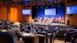 © ELENA AI - A woman sits in a large auditorium during a global meeting with flags and screens on stage. Concept of international diplomacy, cooperation, and political summit.
