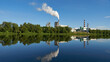 © Pokoman - An industrial factory on the riverbank. environmental pollution