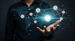 © farhan - Professional businessman holding a glowing digital network interface featuring interconnected people icons representing global communication and modern corporate connectivity in this sophisticated and