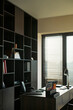 © DragonImages - Vertical shot of empty office desk standing in legal workspace, suggesting divorce attorney consultation, separation paperwork, mediation service, vertical