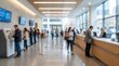 © CuteBee - Blurred view of modern bank lobby with people visiting financial center and using self service banking technology in spacious professional office environment with floor to ceiling windows