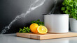 © syhin_stas - Pot simmering with lemons, fresh green herbs and steam on a wooden board, creating a cozy, natural home fragrance and inviting, comforting kitchen ambiance