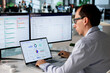 © Andrey Popov - Man Analyzes Compliance Dashboard On Laptop