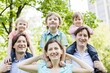© Juan - Families with children enjoying sunny day in nature