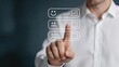 © Jun - Businessman selecting positive smiley face on digital interface for customer satisfaction survey, feedback and rating concept with happy expression icon selected by finger touch.