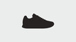 © Abhinaya Project - A black silhouette of a sneaker.