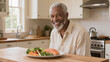 © Lumi Stock Studio - Smiling elderly Black man enjoying healthy salmon vegetable meal in sunlit modern kitchen, authentic senior wellness nutrition lifestyle, editorial healthcare photography with copy space