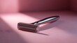 © Bussakon - A sleek chrome blade rests on a soft pink gradient surface emphasizing sharp details and dramatic lighting
