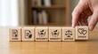 © Asset Arc - Wooden cubes arranged to represent core business ethics principles code integrity honesty justice and ethics with a hand placing the final cube symbolizing commitment and ethical decision making