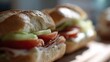 © Iman - Freshly Made Sandwich with Layers of Tomato, Lettuce, Ham, and Mayonnaise on a Soft Roll Captured in Natural Light for Culinary Photography
