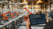 © onephoto - Engineer using tablet dashboard in smart factory with robotic automation system for industrial production monitoring, manufacturing analytics, and operational data management.