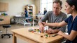 © Maryia - Occupational therapist helps patient practice hand therapy after stroke, using small blocks to improve motor skills, coordination and recovery.