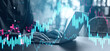 © ImageFlow - Hands typing on laptop with glowing candlestick chart overlay showing financial market activity and volatility in modern business environment..