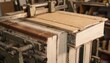 © DigitalSpace - Closeup medium shot of a binding machine assembling shortrun blankbooks with unique cover designs emphasizing the artisanal quality and tailored finishing process.