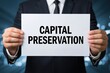 © Prazis Images - Businessman with a Sign for Capital Preservation