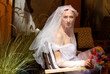© kavardakova - young sexy homosexual man posing in bride's dress
