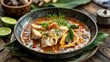© lastfurianec - The famous Indonesian spicy fish soup called Ikan Asam Pedas.