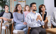 © JackF - Young people look with interest at the presentation of a lecture on history and foreign languages, they are preparing for exams. Students listening to teacher in classroom