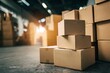 © Shah Zain - Stacks of cardboard boxes in a warehouse storage facility interior with industrial lighting