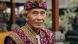 © rafani - Portrait of an elderly Balinese man in traditional ceremonial clothing.