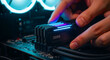 © MURPHY AOIFE GRACE - Hands installing DDR5 RAM memory modules into a computer motherboard. High-performance PC building with RGB lighting and modern hardware. Technology upgrade concept for IT and gaming marketing.