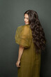 © millaf (Nemchinova) - Nice woman hair. Beautiful model with long curly hairstyle posing